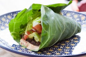 Photograph of a wrap made from a collard leaf. Click to get your personalized custom keto diet plan.