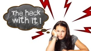 Photograph of a young woman saying, "the heck with it" out of boredom. Click to learn about getting a customized keto diet plan designed based on your activity level, food preferences, weight goals, and other personal criteria.